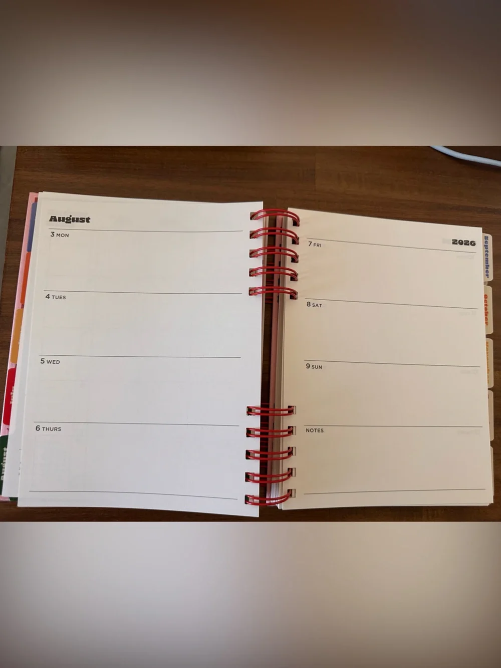 Pulsar Planner with Pink Background and Red Abstract Floral